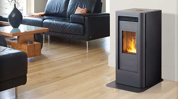 GF40 Pellet Stove in living room with sofa and coffee table